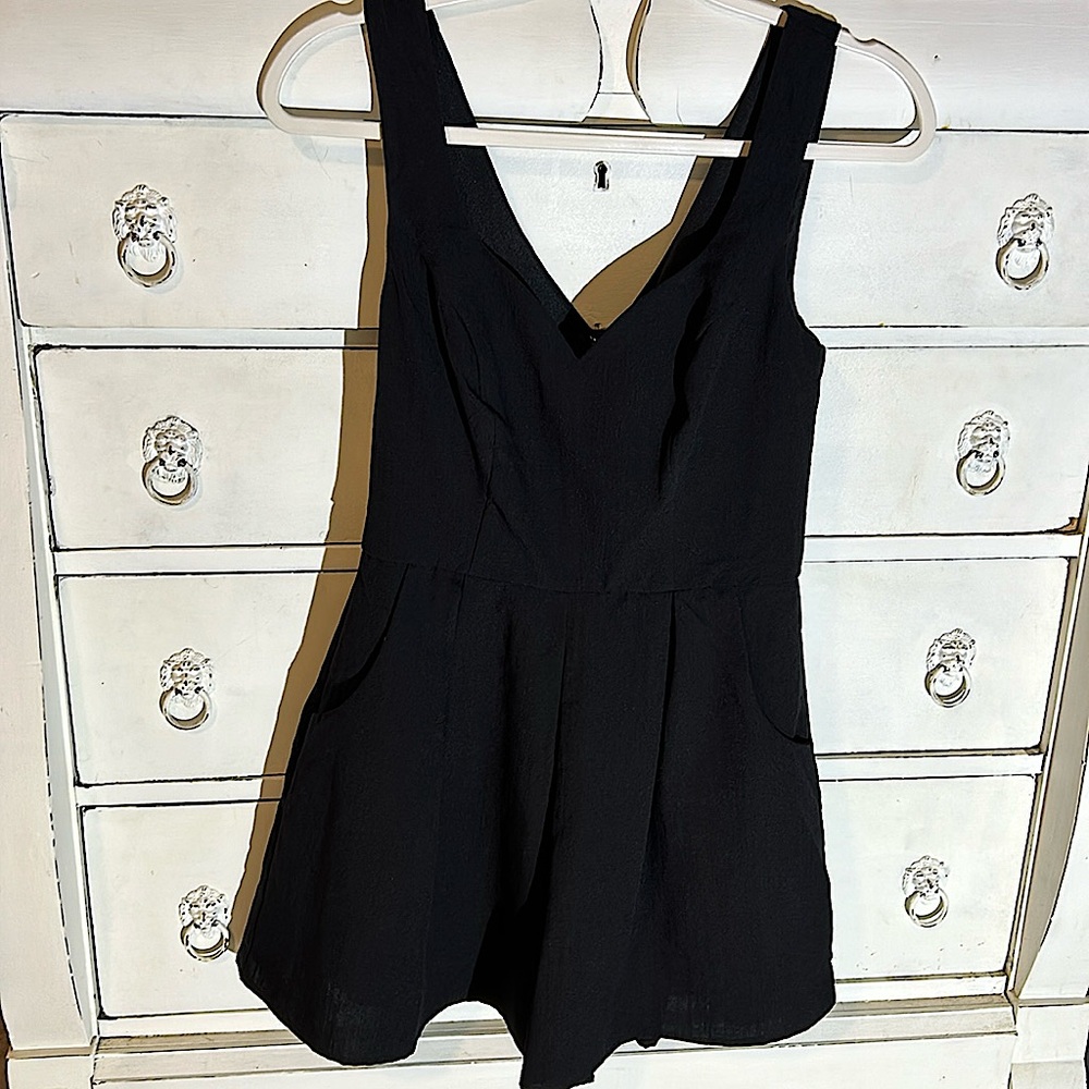 NWT black size Small one piece jumper